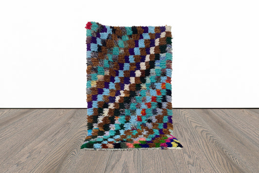 Small colorful checker area 3x5 rug.