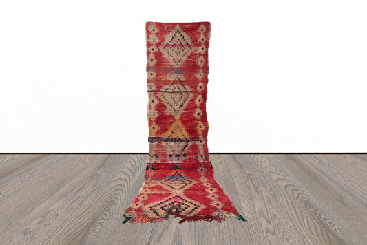 Narrow faded vintage 3x11 runner rug.