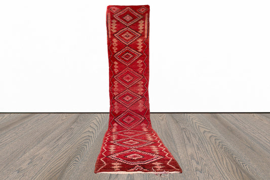 Long Moroccan red 3x14 runner rug.