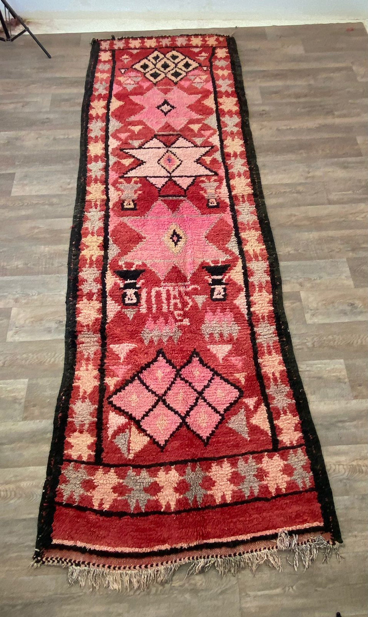 Narrow Moroccan vintage 4x12 runner rug.