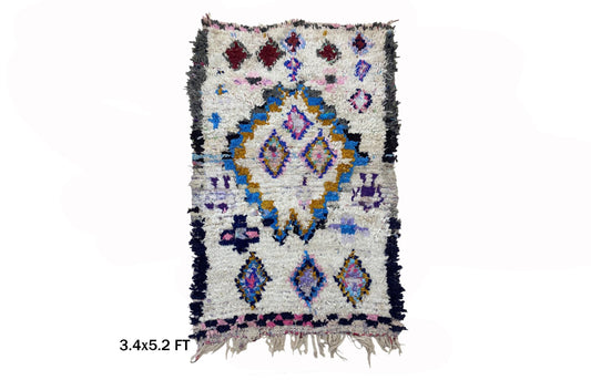 Tapis marocain Boucherouite 3x5 : petit décor bohème vintage.